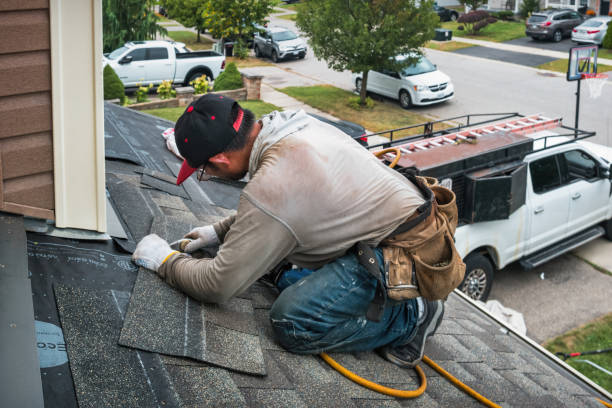 Professional Gutter Installation technician working in Jamaica Plain, MA